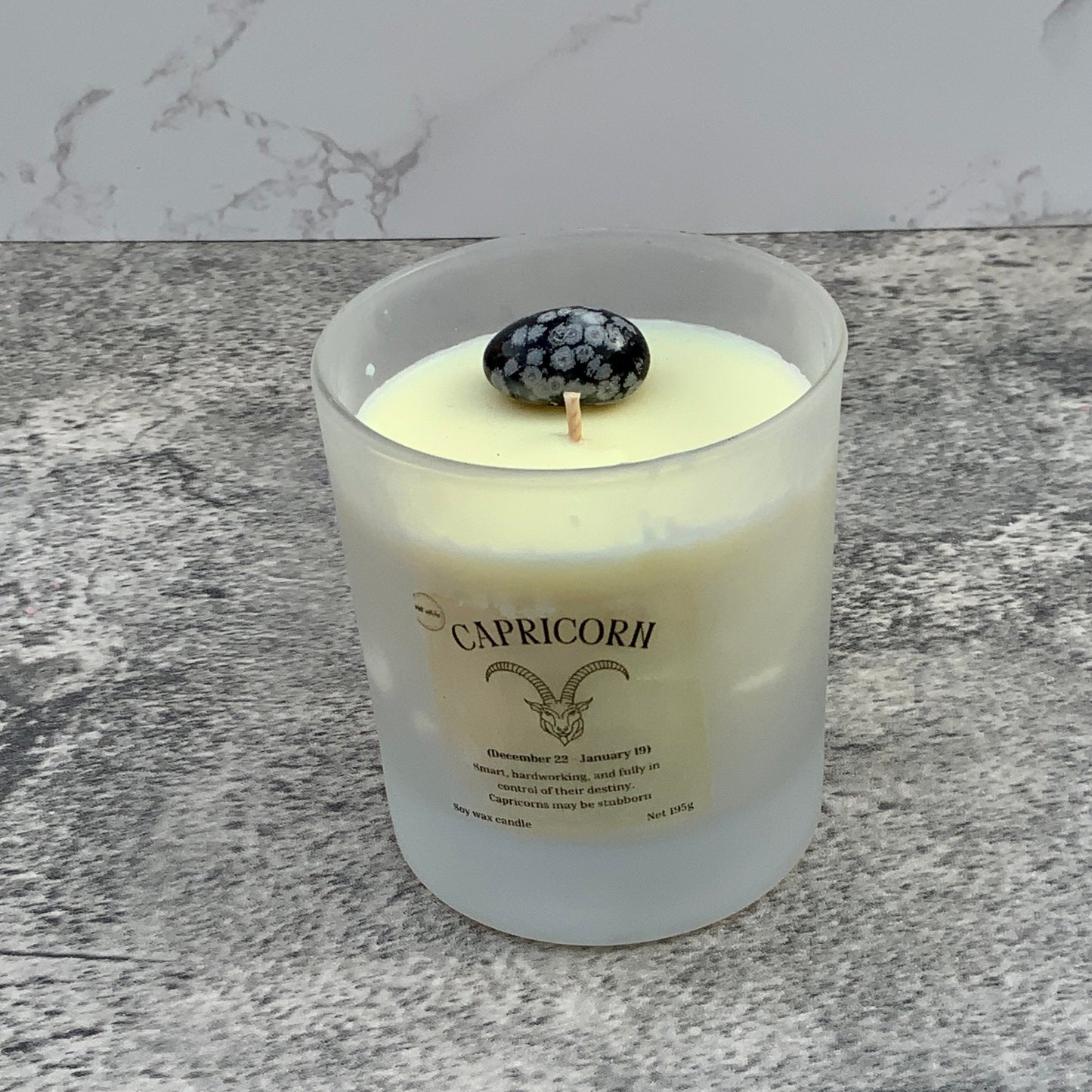 Capricorn star sign candle