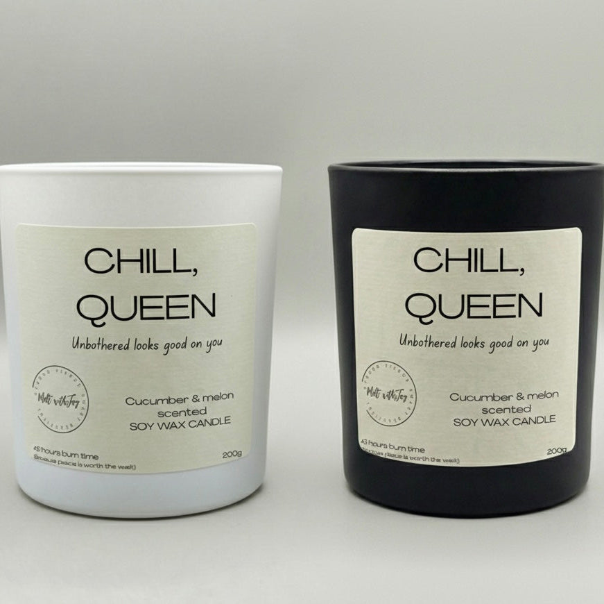 Two candles labeled 'Chill, Queen' on a light gray background
