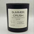 Black candle with a label titled 'Mama Bear Mode' on a light gray background