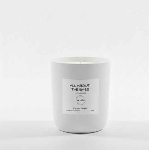 White candle with a label on a white background