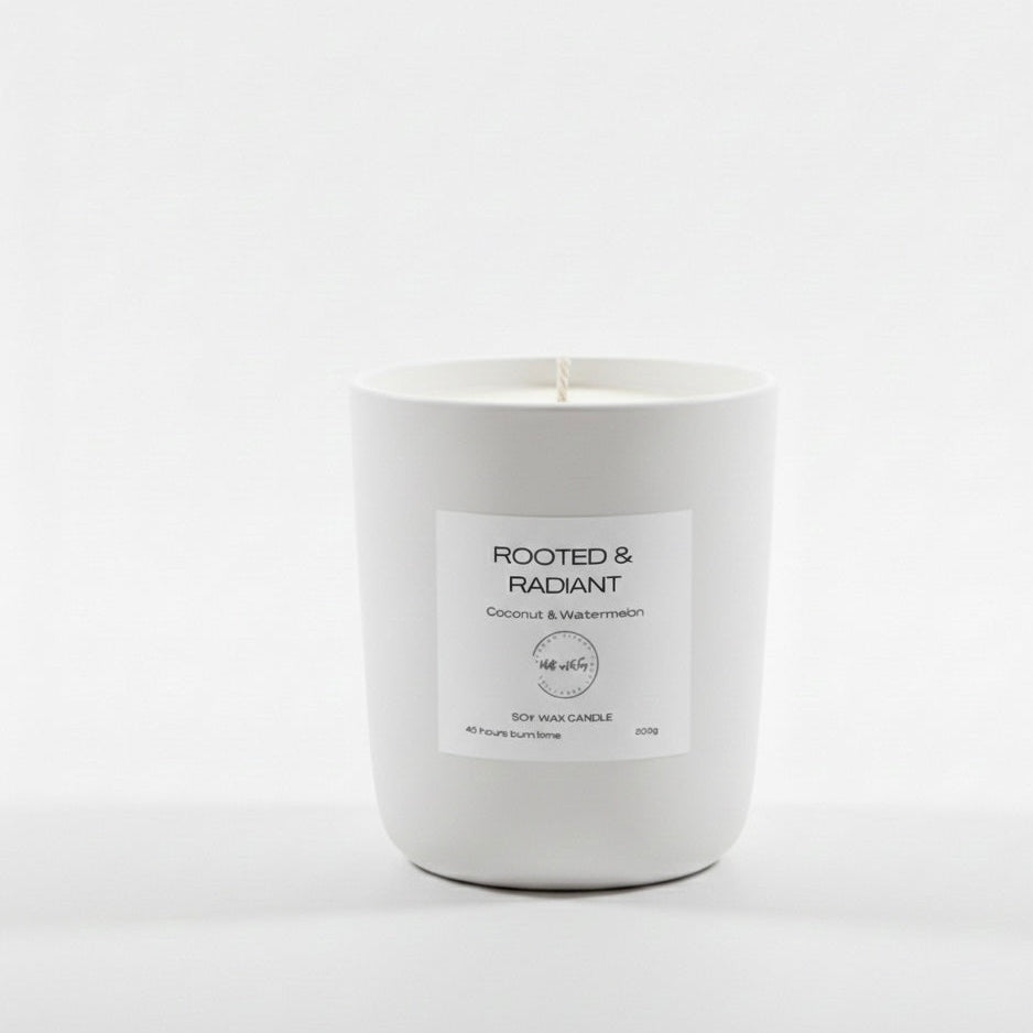 White candle with a label on a white background